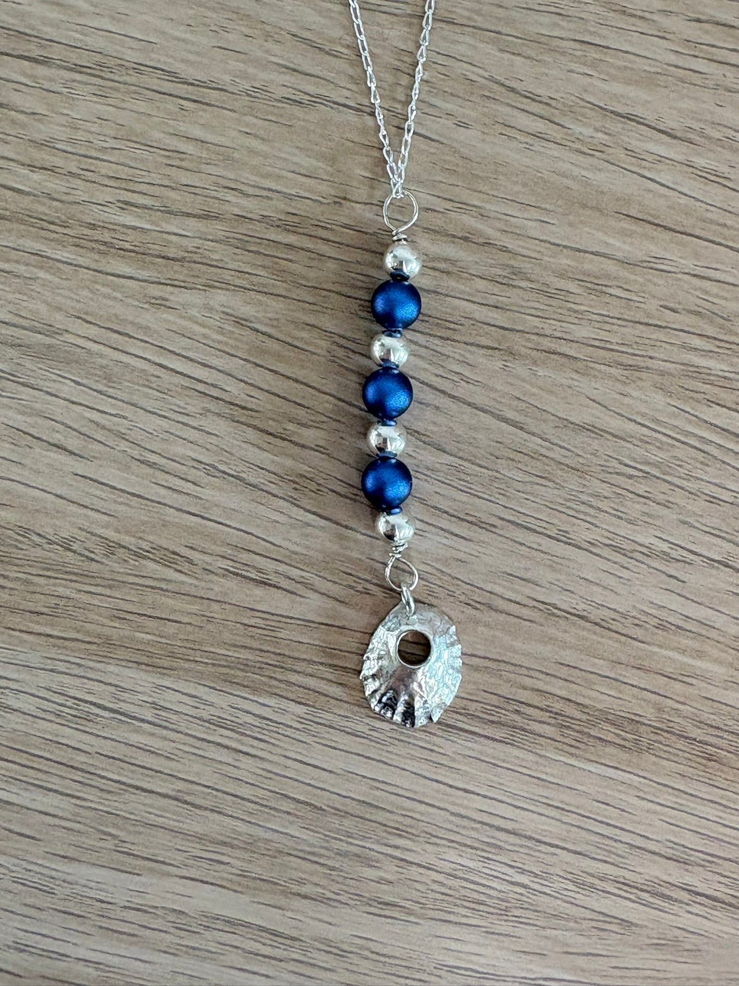 Bàirneach Neamhnaid Ghorm (Blue Pearl Limpet)